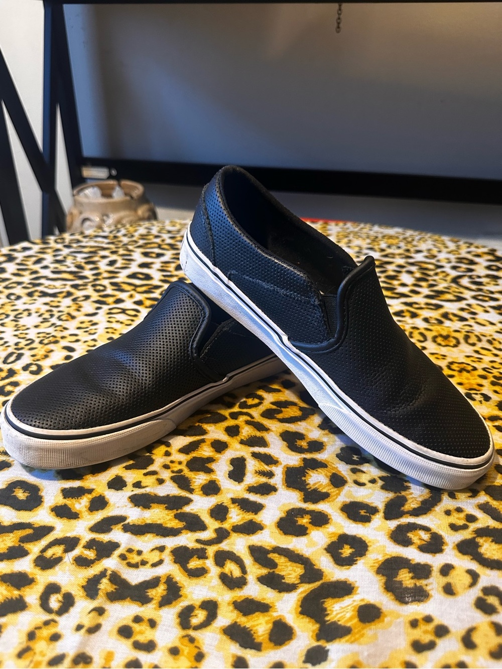 Vans - Black leather perforated slip-ons